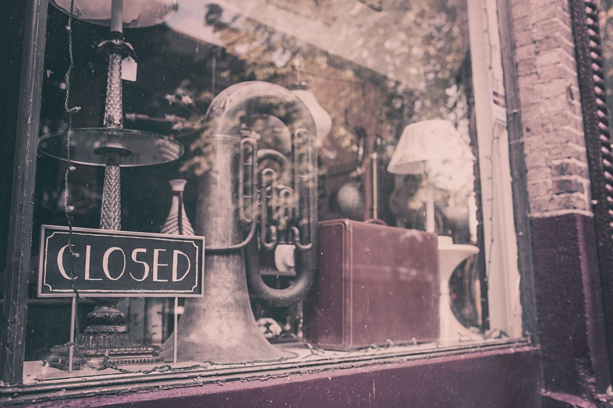 Photo of an old tuba in a closed music storey image by Ryan McGuire on Pixabay.com