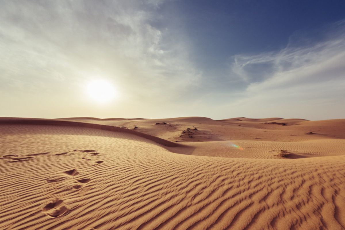 image of hot desert with sun for haiku verse desert dangers by author jenisecook.com