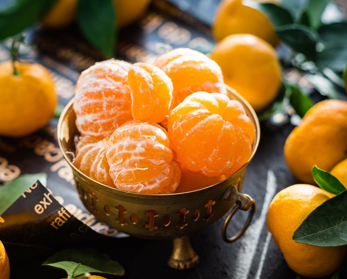 photo image of bowl of tangerines for haiku verse sunshine love by author jenisecook.com
